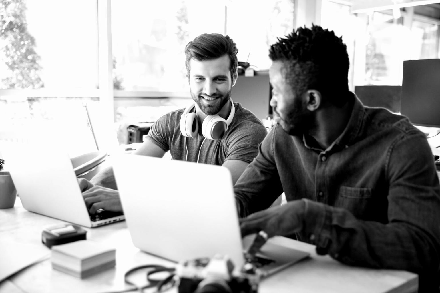 Professional meeting with business team reviewing financial charts and budget planning documents